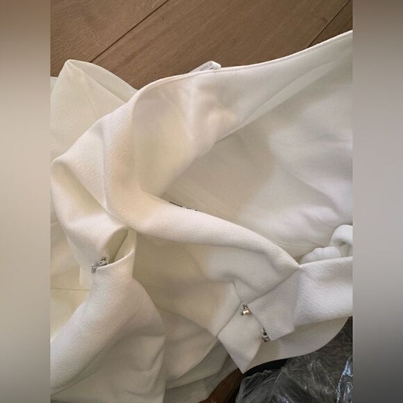 Julia Jordan
Knot Halter Neck Sleeveless Faux Wrap Tulip Hem Midi Dress IVORY - Picture 6 of 7